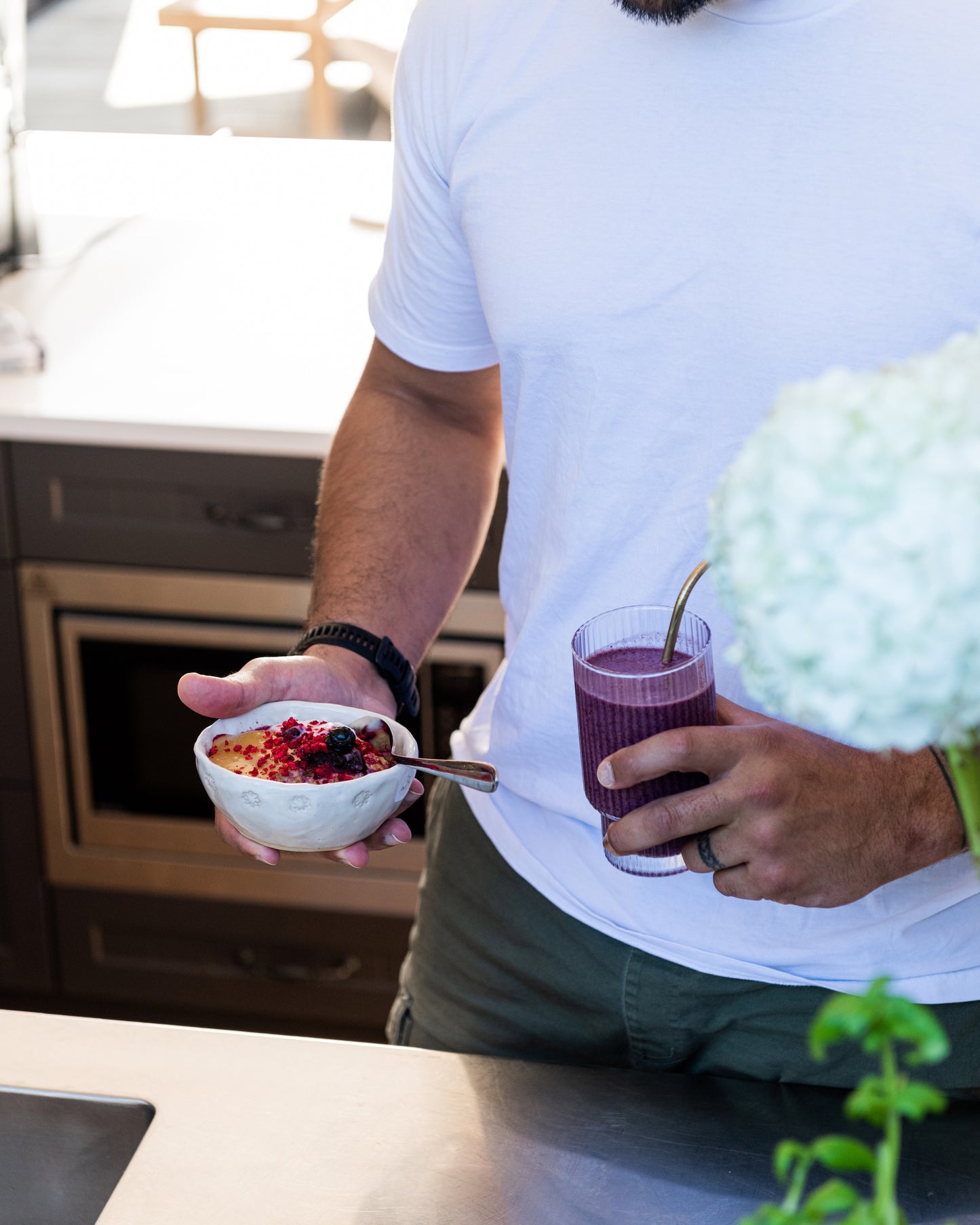 Man eating Bowl and Arrow Good Mornings overnight oat mix and smoothie